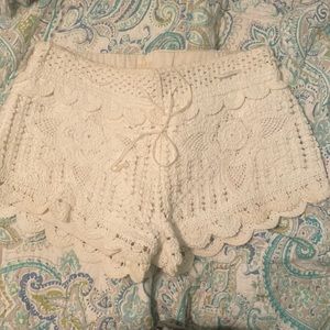small boutique lace shorts. slight stain in front bottom- minimal